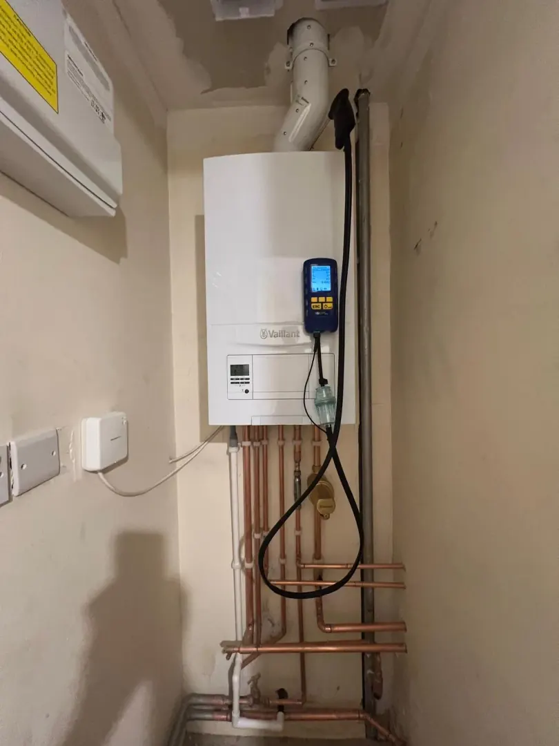 New high-efficiency Vaillant boiler installed with clean pipework