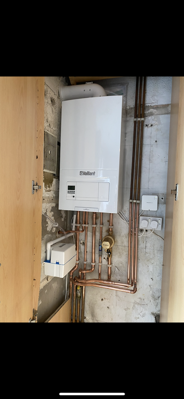 New Vaillant boiler installed with condensate pump and copper pipework