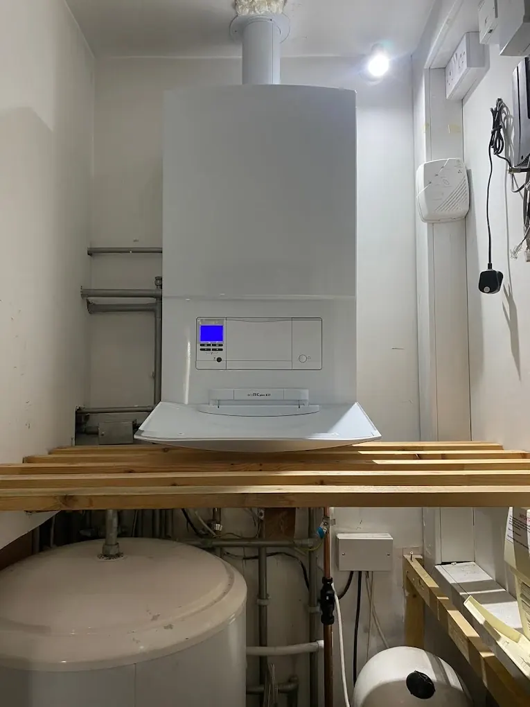 Boiler installed in loft eaves space above new timber supports